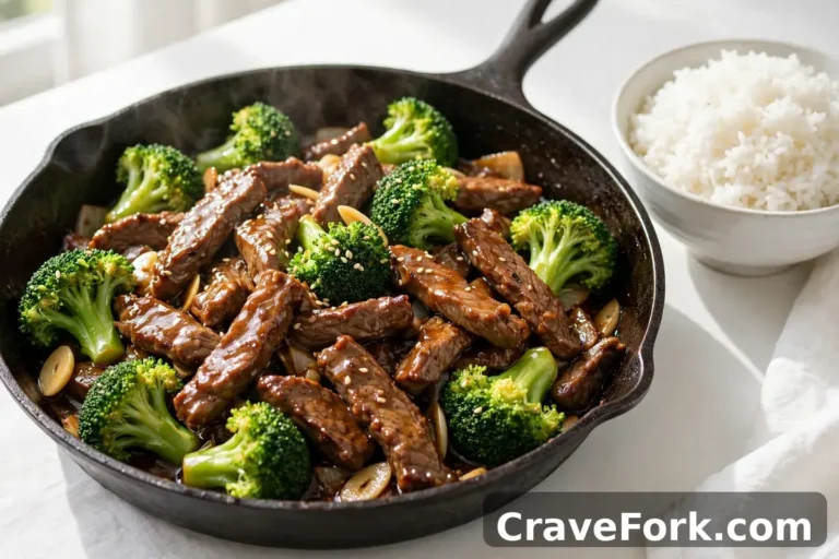 Beef and broccoli stir-fry in a pan served with rice.