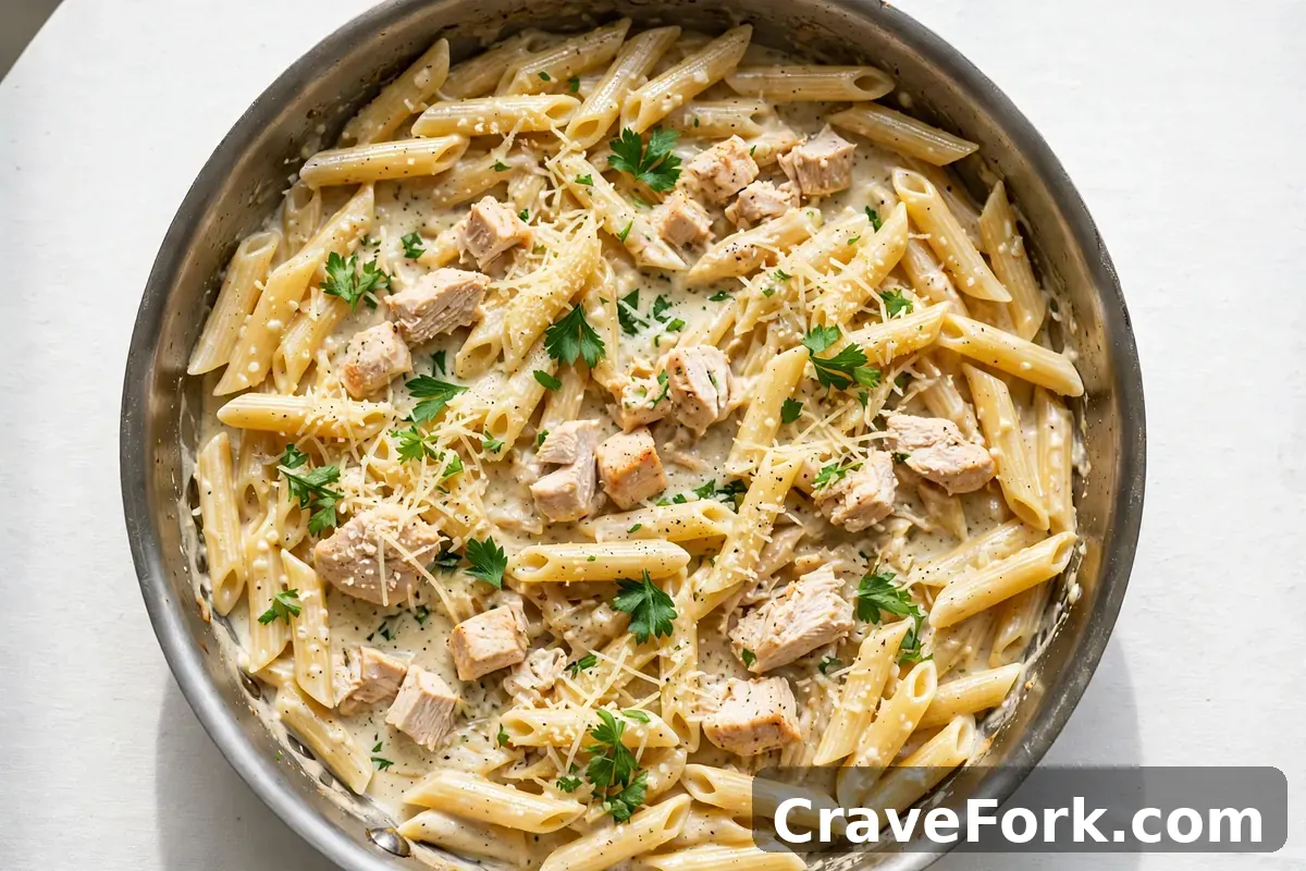 One-pan creamy garlic chicken pasta in a pan